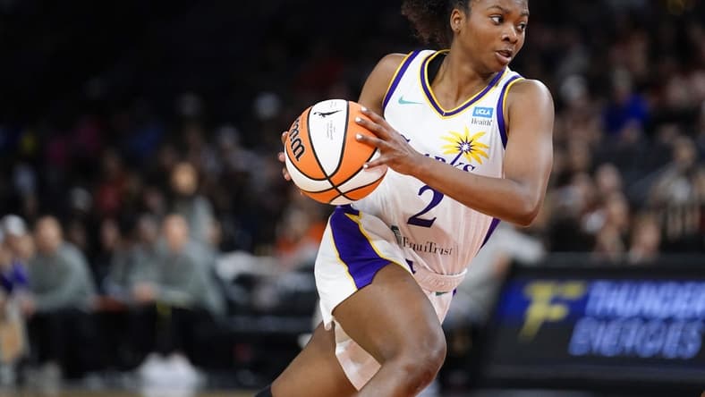 May 27, 2023; Las Vegas, Nevada, USA; Los Angeles Sparks guard Nia Clouden (2) drives the ball against the Las Vegas Aces during the fourth quarter at Michelob Ultra Arena. Mandatory Credit: Lucas Peltier-USA TODAY Sports