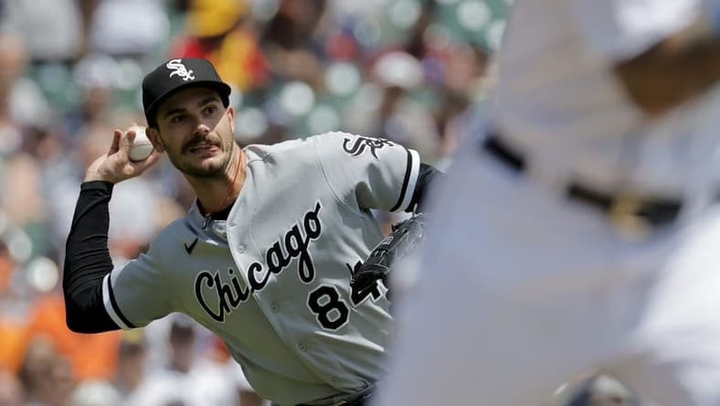 May 28, 2023; Detroit, Michigan, USA; Chicago White Sox starting pitcher Dylan Cease (84) makes a throw to first in the first inning against the Detroit Tigers at Comerica Park. Mandatory Credit: Rick Osentoski-USA TODAY Sports