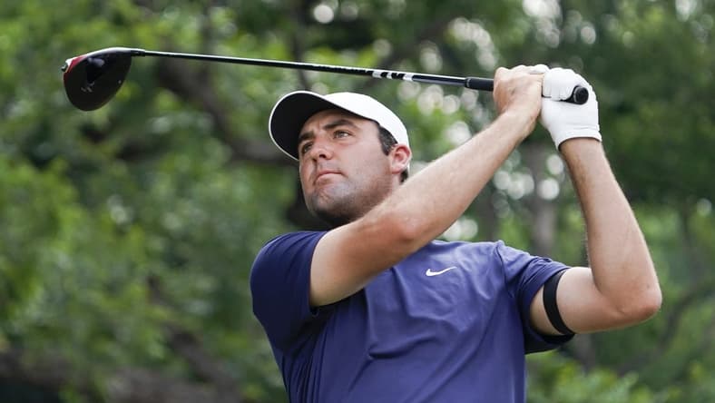 May 28, 2023; Fort Worth, Texas, USA; Scottie Scheffler plays his shot from the second tee during the final round of the Charles Schwab Challenge golf tournament. Mandatory Credit: Raymond Carlin III-USA TODAY Sports