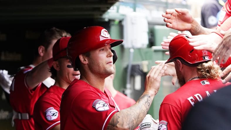 May 28, 2023; Chicago, Illinois, USA; Cincinnati Reds center fielder Nick Senzel (15) after scoring against the Chicago Cubs during the second inning at Wrigley Field. Mandatory Credit: David Banks-USA TODAY Sports