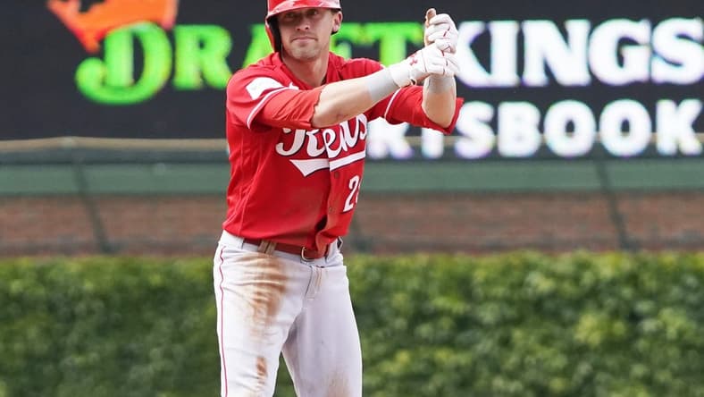 May 28, 2023; Chicago, Illinois, USA; Cincinnati Reds pinch-hitter TJ Friedl (29) gestures after hitting a one-run double against the Chicago Cubs during the fifth inning at Wrigley Field. Mandatory Credit: David Banks-USA TODAY Sports