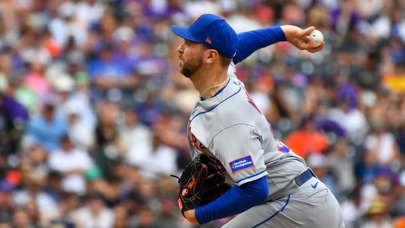May 28, 2023; Denver, Colorado, USA; New York Mets starting pitcher Tylor Megill (38) delivers a pitch in the third inning against the Colorado Rockies at Coors Field. Mandatory Credit: John Leyba-USA TODAY Sports