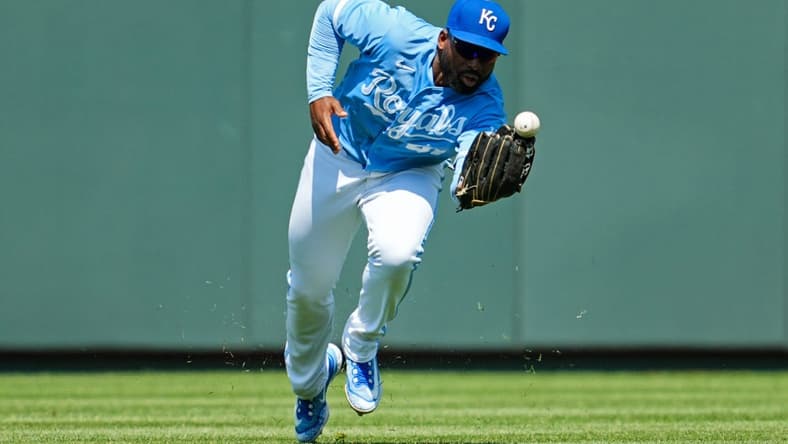 May 28, 2023; Kansas City, Missouri, USA; Kansas City Royals right fielder Jackie Bradley Jr. (41) is unable to make the catch during the eighth inning against the Washington Nationals at Kauffman Stadium. Mandatory Credit: Jay Biggerstaff-USA TODAY Sports