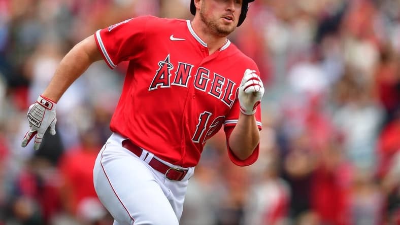 May 28, 2023; Anaheim, California, USA; Los Angeles Angels right fielder Hunter Renfroe (12) runs after hitting a double against the Miami Marlins during the ninth inning at Angel Stadium. Mandatory Credit: Gary A. Vasquez-USA TODAY Sports