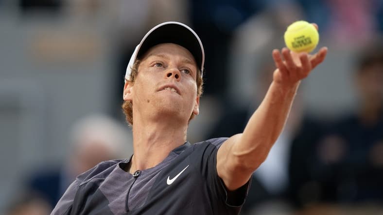 May 29, 2023; Paris,France; Jannik Sinner (ITA) tosses the ball to serve during his match against Alexandre Muller (FRA) on day two at Stade Roland-Garros. Mandatory Credit: Susan Mullane-USA TODAY Sports