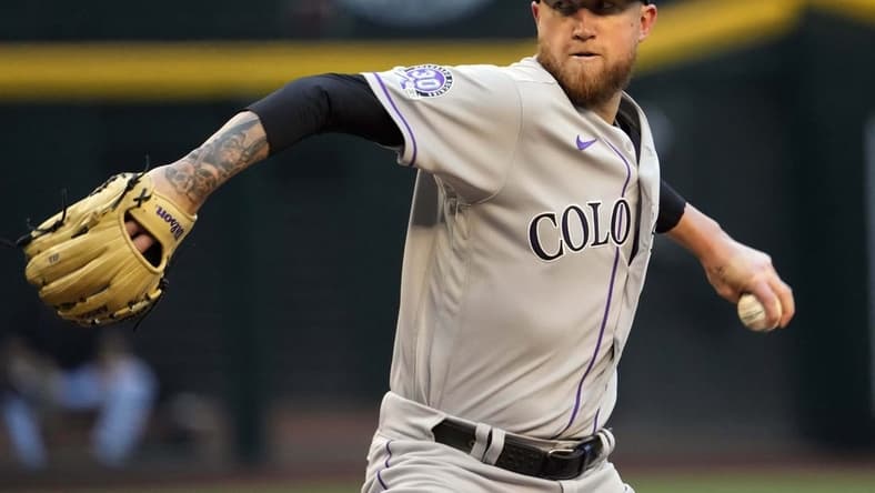 May 30, 2023; Phoenix, Arizona, USA; Colorado Rockies starting pitcher Kyle Freeland (21) pitches against the Arizona Diamondbacks during the first inning at Chase Field. Mandatory Credit: Joe Camporeale-USA TODAY Sports