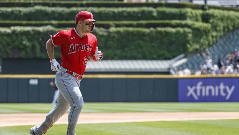 May 31, 2023; Chicago, Illinois, USA; Los Angeles Angels center fielder Mike Trout (27) rounds the bases after hitting a two-run home run against the Chicago White Sox during the first inning at Guaranteed Rate Field. Mandatory Credit: Kamil Krzaczynski-USA TODAY Sports