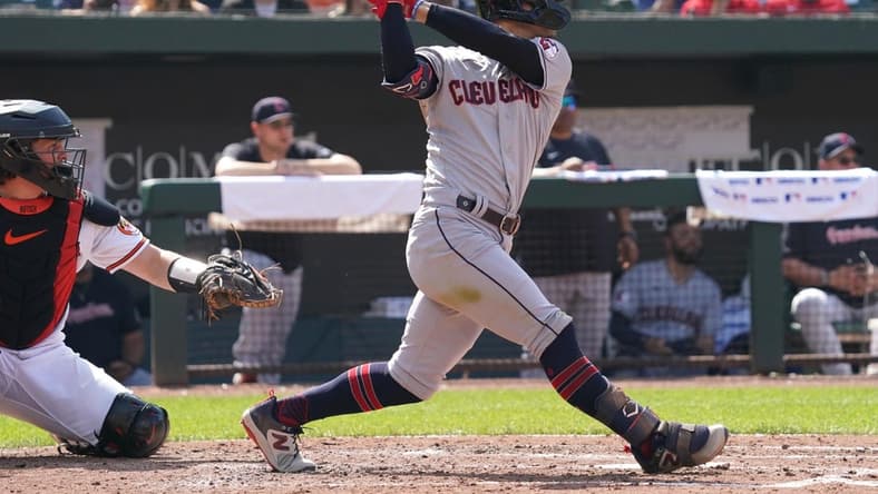 May 31, 2023; Baltimore, Maryland, USA; Cleveland Guardians second baseman Andres Gimenez (0) drives in a run in the second inning against the Baltimore Orioles at Oriole Park at Camden Yards. Mandatory Credit: Mitch Stringer-USA TODAY Sports