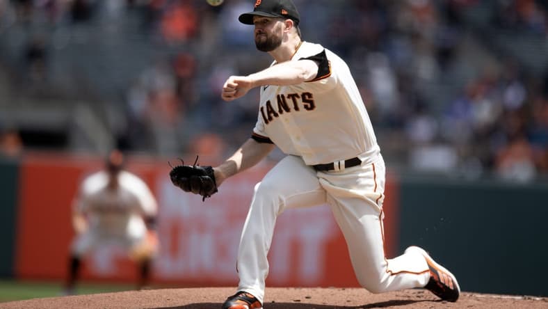 May 31, 2023; San Francisco, California, USA; San Francisco Giants starting pitcher Alex Wood (57) delivers a pitch against the Pittsburgh Pirates during the first inning at Oracle Park. Mandatory Credit: D. Ross Cameron-USA TODAY Sports