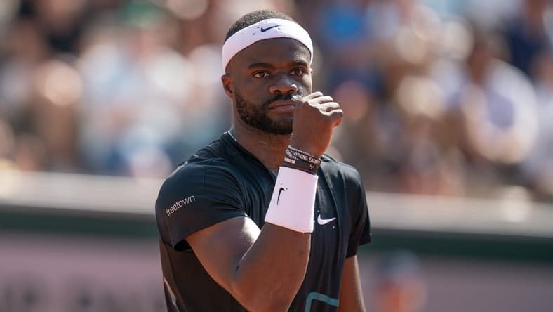 Jun 1, 2023; Paris,France; Frances Tiafoe (USA) reacts to a point during his match against Asian Karatsev on day five at Stade Roland-Garros. Mandatory Credit: Susan Mullane-USA TODAY Sports