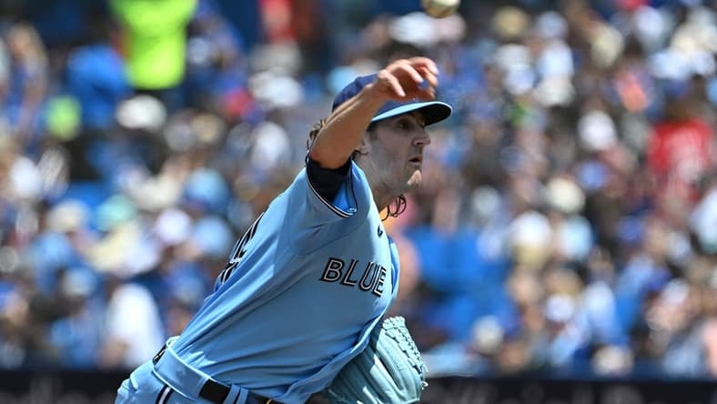 Jun 1, 2023; Toronto, Ontario, CAN; Toronto Blue Jays starting pitcher Kevin Gausman (34) delivers a pitch against the Milwaukee Brewers in the first inning at Rogers Centre. Mandatory Credit: Dan Hamilton-USA TODAY Sports