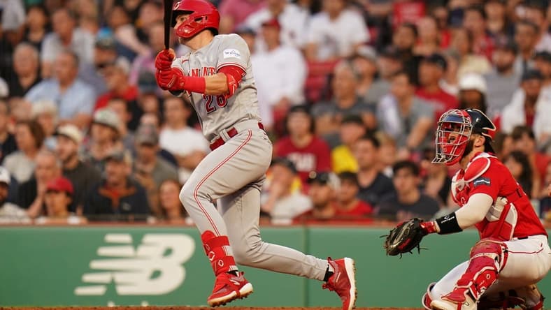 Jun 1, 2023; Boston, Massachusetts, USA; Cincinnati Reds shortstop Kevin Newman (28) hits a double and drives in a run against the Boston Red Sox in the third inning at Fenway Park. Mandatory Credit: David Butler II-USA TODAY Sports