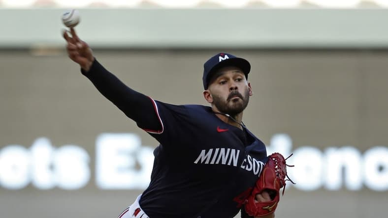 Jun 1, 2023; Minneapolis, Minnesota, USA; Minnesota Twins starting pitcher Pablo Lopez (49) throws to the Cleveland Guardians in the first inning at Target Field. Mandatory Credit: Bruce Kluckhohn-USA TODAY Sports