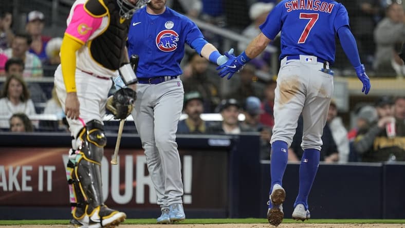 Jun 2, 2023; San Diego, California, USA; Chicago Cubs shortstop Dansby Swanson (7) scores after hitting a home run against the San Diego Padres during the fifth inning at Petco Park. Mandatory Credit: Ray Acevedo-USA TODAY Sports