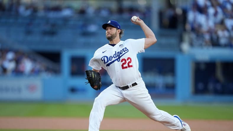 Jun 2, 2023; Los Angeles, California, USA; Los Angeles Dodgers starting pitcher Clayton Kershaw (22) throws in the first inning against the New York Yankees at Dodger Stadium. Mandatory Credit: Kirby Lee-USA TODAY Sports