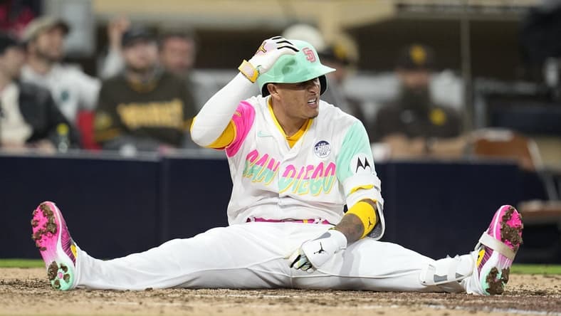 Jun 2, 2023; San Diego, California, USA; San Diego Padres third baseman Manny Machado (13) reacts to an inside pitch during the ninth inning against the Chicago Cubs at Petco Park. Mandatory Credit: Ray Acevedo-USA TODAY Sports