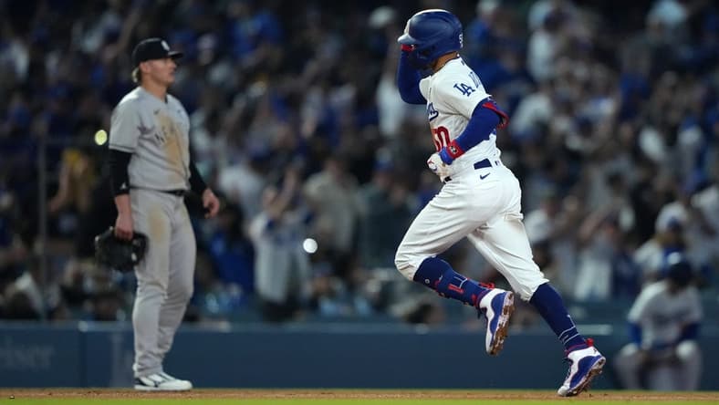 Jun 2, 2023; Los Angeles, California, USA; Los Angeles Dodgers right fielder Mookie Betts (50) rounds the bases after hitting a home run in the sixth inning against the New York Yankees at Dodger Stadium. Mandatory Credit: Kirby Lee-USA TODAY Sports
