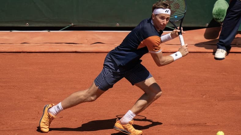 Jun 3, 2023; Paris,France; Casper Ruud (NOR) returns a shot during his match against Zhizhen Zhang (CHN) on day seven at Stade Roland-Garros. Mandatory Credit: Susan Mullane-USA TODAY Sports