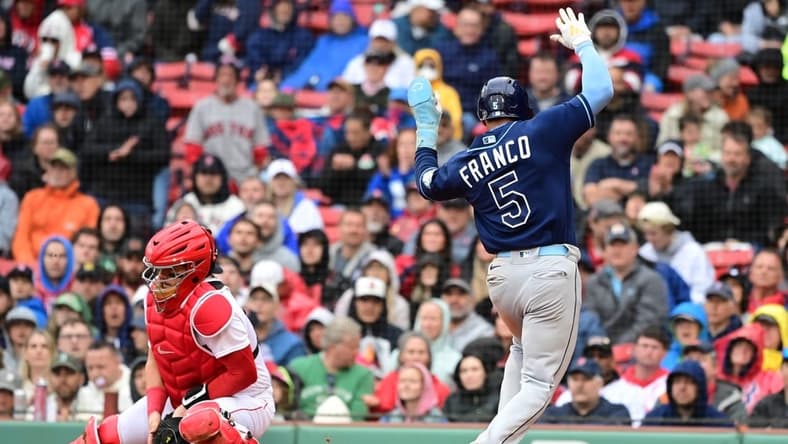 Jun 3, 2023; Boston, Massachusetts, USA; Tampa Bay Rays shortstop Wander Franco (5) scores a run against the Boston Red Sox during the fifth inning at Fenway Park. Mandatory Credit: Eric Canha-USA TODAY Sports