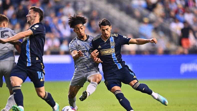 Jun 3, 2023; Philadelphia, Pennsylvania, USA; Philadelphia Union forward Julian Carranza (9) fights for the ball against CF Montreal midfielder Nathan-Dylan Saliba (19) during the first half at Subaru Park. Mandatory Credit: Kyle Ross-USA TODAY Sports
