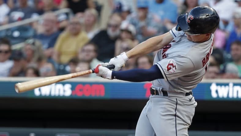 Jun 3, 2023; Minneapolis, Minnesota, USA; Cleveland Guardians right fielder Will Brennan (17) hits a two-run home run against the Minnesota Twins in the seventh inning at Target Field. Mandatory Credit: Bruce Kluckhohn-USA TODAY Sports