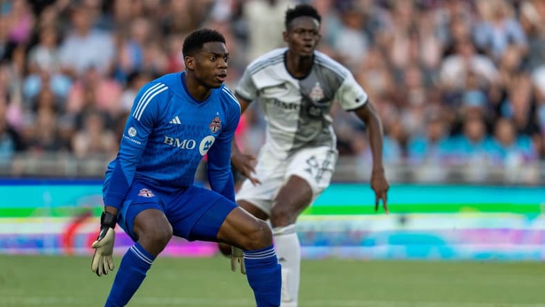 Jun 3, 2023; Saint Paul, Minnesota, USA; Toronto FC goalkeeper Sean Johnson (1) prepares for the shot backed up by Toronto FC defender Aime Mabika (6) against Minnesota United in the first half at Allianz Field. Mandatory Credit: Matt Blewett-USA TODAY Sports