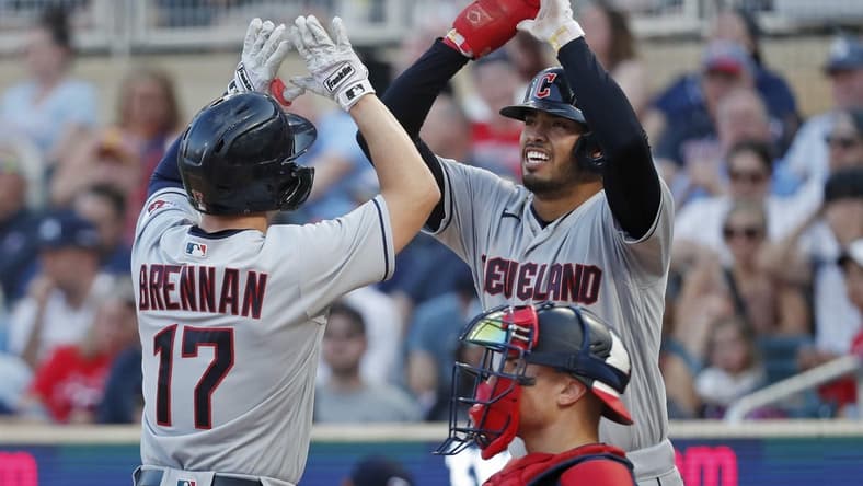 Jun 3, 2023; Minneapolis, Minnesota, USA; Cleveland Guardians first baseman Gabriel Arias (13) celebrates the home run by right fielder Will Brennan (17) that sent them both in against the Minnesota Twins in the seventh inning at Target Field. Mandatory Credit: Bruce Kluckhohn-USA TODAY Sports