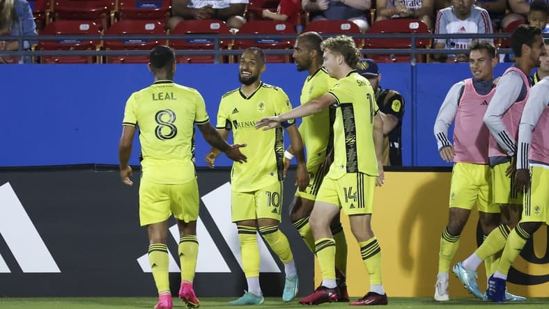 Jun 3, 2023; Frisco, Texas, USA;  Nashville SC midfielder Hany Mukhtar (10) celebrates with teammates after scoring a goal during the second half against FC Dallas at Toyota Stadium. Mandatory Credit: Kevin Jairaj-USA TODAY Sports