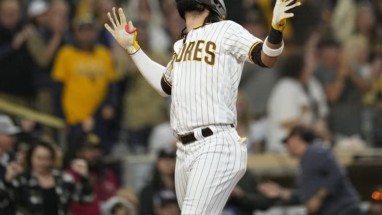 Jun 3, 2023; San Diego, California, USA; San Diego Padres right fielder Fernando Tatis Jr. (23) reacts to his home run against the Chicago Cubs during the third inning at Petco Park. Mandatory Credit: Ray Acevedo-USA TODAY Sports