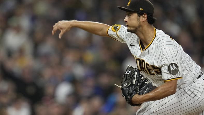 Jun 3, 2023; San Diego, California, USA; San Diego Padres starting pitcher Yu Darvish (11) throws a pitch against the Chicago Cubs during the sixth inning at Petco Park. Mandatory Credit: Ray Acevedo-USA TODAY Sports