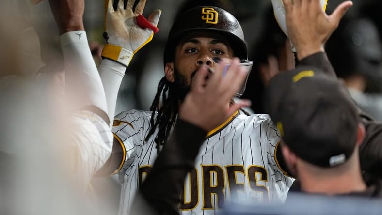 Jun 3, 2023; San Diego, California, USA; San Diego Padres right fielder Fernando Tatis Jr. (23) celebrates his home run against the Chicago Cubs during the eighth inning at Petco Park. Mandatory Credit: Ray Acevedo-USA TODAY Sports