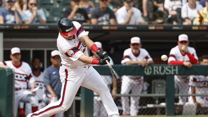 Jun 4, 2023; Chicago, Illinois, USA; Chicago White Sox third baseman Jake Burger (30) hits a grand slam walk-off against the Detroit Tigers during the ninth inning at Guaranteed Rate Field. Mandatory Credit: Kamil Krzaczynski-USA TODAY Sports