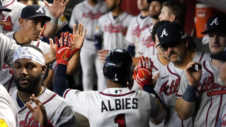 Jun 4, 2023; Phoenix, AZ, USA; Atlanta Braves' Ozzie Albies (1) celebrates his 3-run home run with teammates as they play the Arizona Diamondbacks at Chase Field. Mandatory Credit: Joseph Rondone-USA TODAY Sports