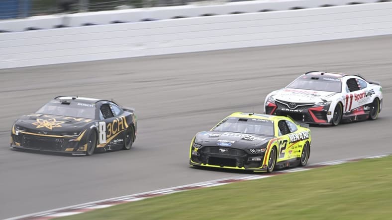 Jun 4, 2023; Madison, Illinois, USA; NASCAR Cup Series driver Kyle Busch (8) leads NASCAR Cup Series driver Ryan Blaney (12) and NASCAR Cup Series driver Denny Hamlin (11) during the Enjoy Illinois 300 at World Wide Technology Raceway. Mandatory Credit: Joe Puetz-USA TODAY Sports