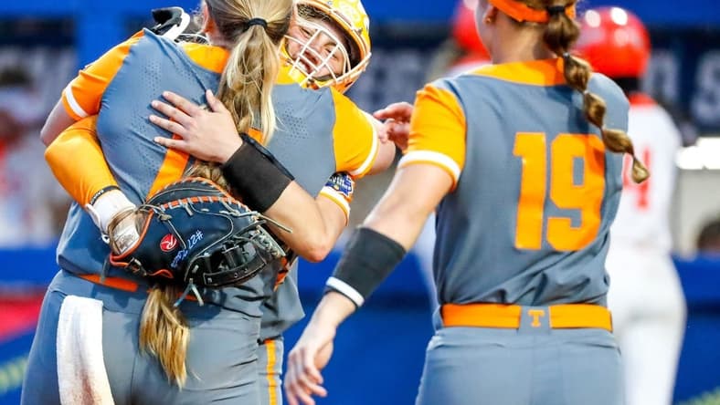 Tennessee players celebrate after winning a softball game between Oklahoma State (OSU) and Tennessee at the Women's College World Series at USA Softball Hall of Fame Stadium in in Oklahoma City on Sunday, June 4, 2023.