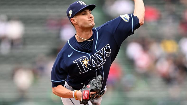 Jun 5, 2023; Boston, Massachusetts, USA; Tampa Bay Rays starting pitcher Shane McClanahan (18) pitches against the Boston Red Sox during the first inning at Fenway Park. Mandatory Credit: Brian Fluharty-USA TODAY Sports