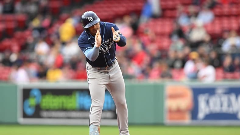 Jun 5, 2023; Boston, Massachusetts, USA; Tampa Bay Rays shortstop Wander Franco (5) reacts after hitting a double against the Boston Red Sox during the seventh inning at Fenway Park. Mandatory Credit: Brian Fluharty-USA TODAY Sports