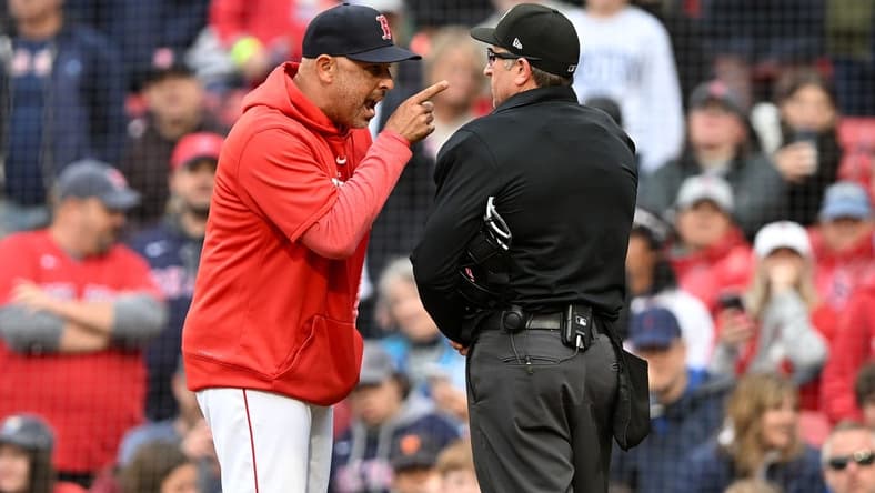 Jun 5, 2023; Boston, Massachusetts, USA; Boston Red Sox manager Alex Cora argues with umpire Chris Guccione (68) at the end of the eighth inning of a game against the Tampa Bay Rays at Fenway Park. Mandatory Credit: Brian Fluharty-USA TODAY Sports