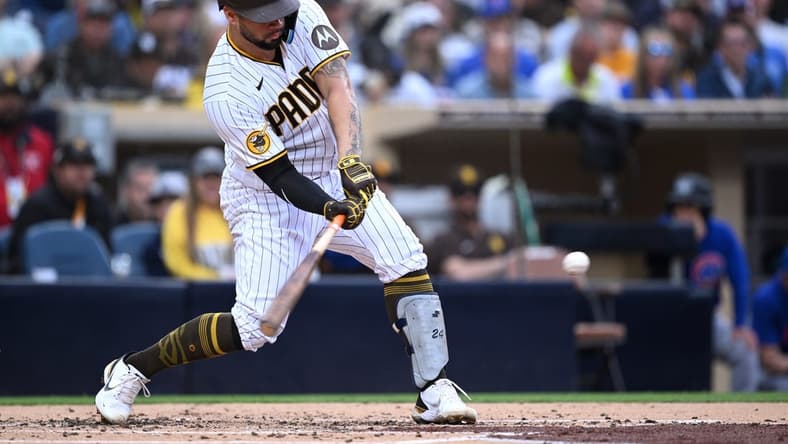 Jun 5, 2023; San Diego, California, USA; San Diego Padres catcher Gary Sanchez (99) hits a two-run home run against the Chicago Cubs during the second inning at Petco Park. Mandatory Credit: Orlando Ramirez-USA TODAY Sports
