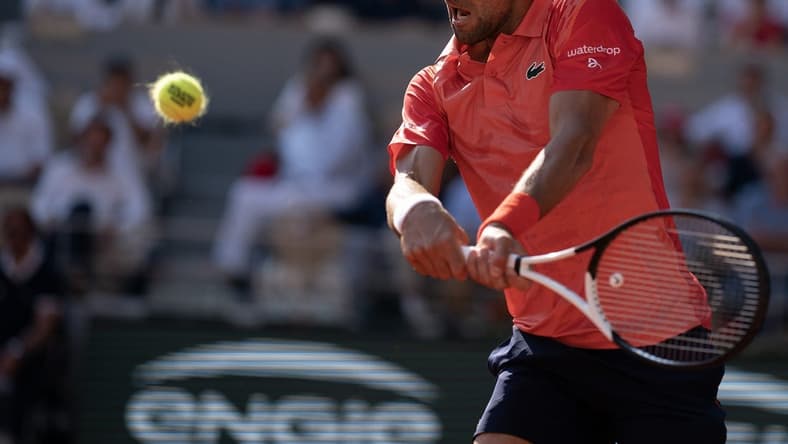 Jun 6 2023; Paris,France; Novak Djokovic (SRB) returns a shot during his match against Karen Khachanov on day 10 at Stade Roland-Garros. Mandatory Credit: Susan Mullane-USA TODAY Sports