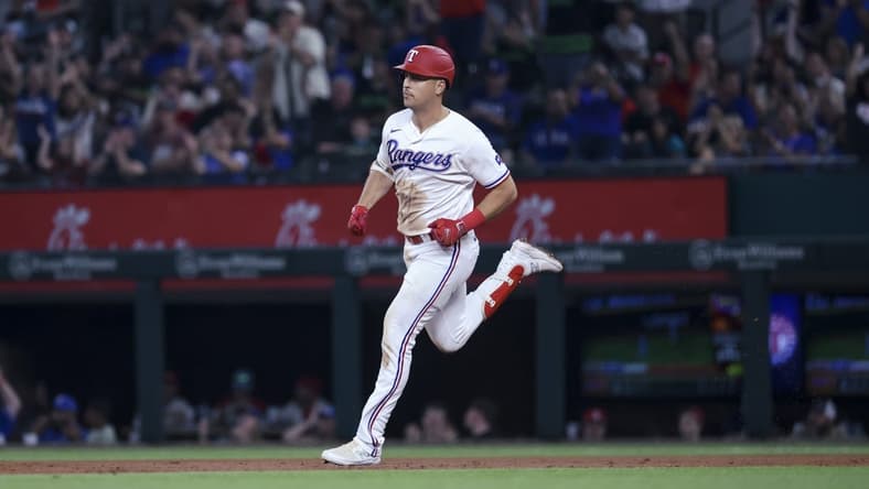 Jun 6, 2023; Arlington, Texas, USA; Texas Rangers first baseman Nathaniel Lowe (30) runs the bases after hitting a home run during the third inning against the St. Louis Cardinals at Globe Life Field. Mandatory Credit: Kevin Jairaj-USA TODAY Sports