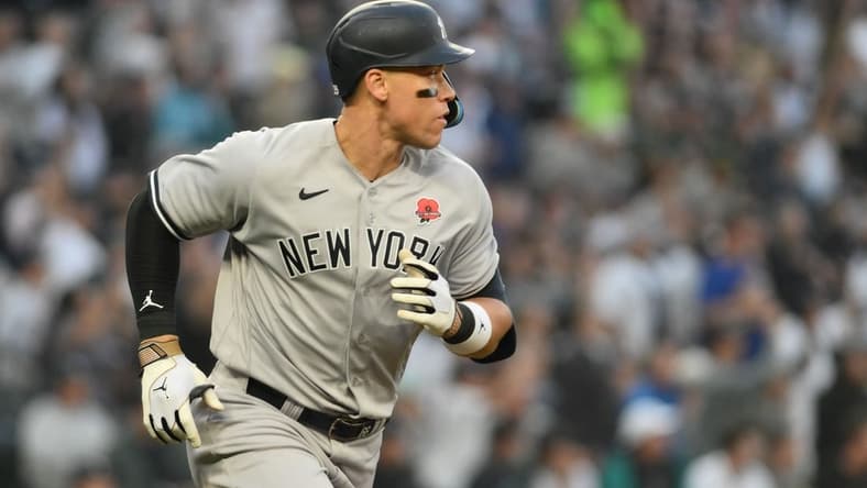 May 29, 2023; Seattle, Washington, USA; New York Yankees right fielder Aaron Judge (99) runs towards first base after hitting the ball against the Seattle Mariners at T-Mobile Park. Mandatory Credit: Steven Bisig-USA TODAY Sports