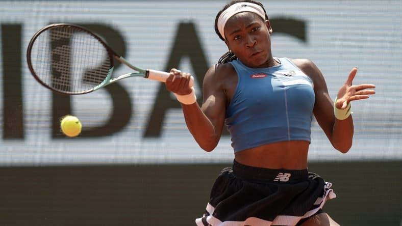 Jun 7 2023; Paris,France; Coco Gauff (USA) returns a shot during her match against Iga Swiatek (POL) on day 11 at Stade Roland-Garros. Mandatory Credit: Susan Mullane-USA TODAY Sports