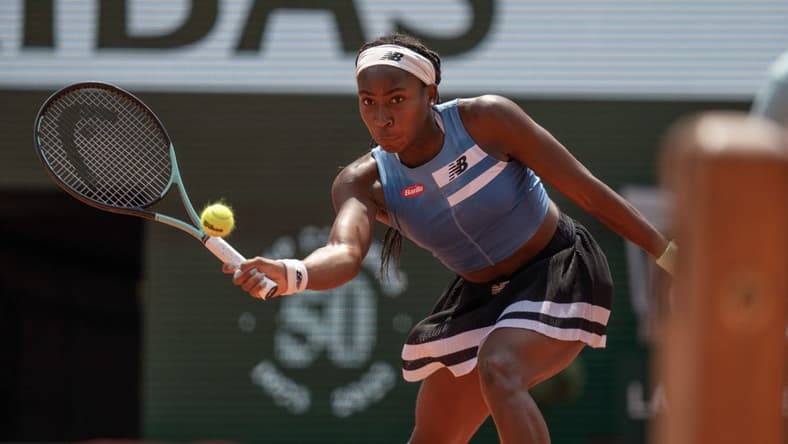 Jun 7 2023; Paris,France; Coco Gauff (USA) returns a shot during her match against Iga Swiatek (POL) on day 11 at Stade Roland-Garros. Mandatory Credit: Susan Mullane-USA TODAY Sports