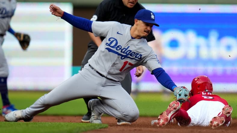 Cincinnati Reds shortstop Matt McLain (9) steals second base in the first inning of a baseball game between the Los Angeles Dodgers and the Cincinnati Reds, Wednesday, June 7, 2023, at Great American Ball Park in Cincinnati.