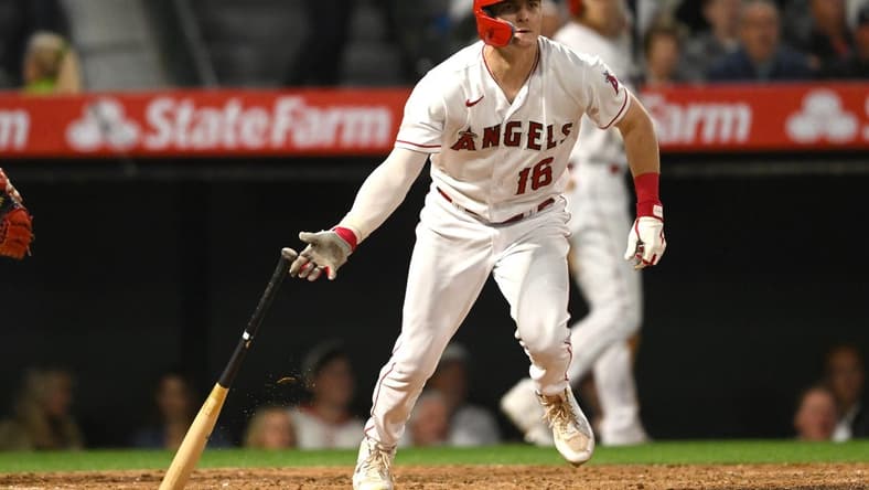 Jun 7, 2023; Anaheim, California, USA; Los Angeles Angels left fielder Mickey Moniak (16) doubles in three runs in the sixth inning against the Chicago Cubs at Angel Stadium. Mandatory Credit: Jayne Kamin-Oncea-USA TODAY Sports