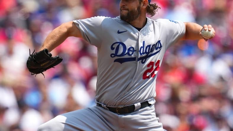 Jun 8, 2023; Cincinnati, Ohio, USA; Los Angeles Dodgers starting pitcher Clayton Kershaw (22) delivers in the first inning against the Cincinnati Reds at Great American Ball Park. Mandatory Credit: Kareem Elgazzar-USA TODAY Sports