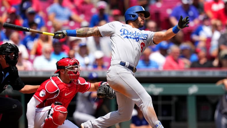 Jun 8, 2023; Cincinnati, Ohio, USA; Los Angeles Dodgers left fielder David Peralta (6) hits a single in the fifth inning against the Cincinnati Reds at Great American Ball Park. Mandatory Credit: Kareem Elgazzar-USA TODAY Sports