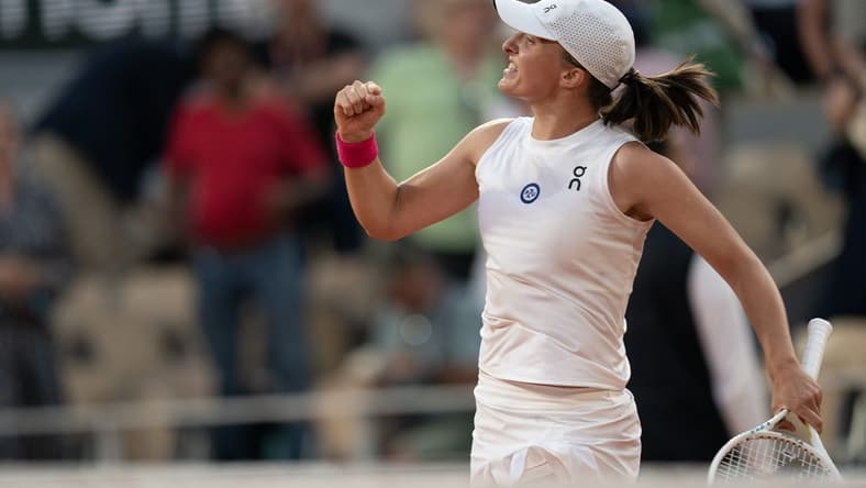 Jun 8 2023; Paris,France; Iga Swiatek (POL) celebrates winning her semi final match agains Beatriz Haddad Maia (BRA) on day 12 at Stade Roland-Garros. Mandatory Credit: Susan Mullane-USA TODAY Sports