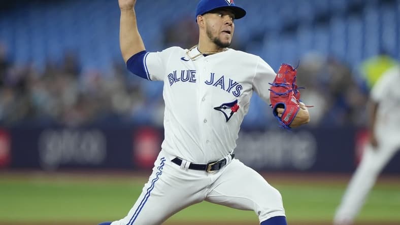 Jun 8, 2023; Toronto, Ontario, CAN; Toronto Blue Jays starting pitcher Jose Berrios (17) pitches to the Houston Astros during the first inning at Rogers Centre. Mandatory Credit: John E. Sokolowski-USA TODAY Sports